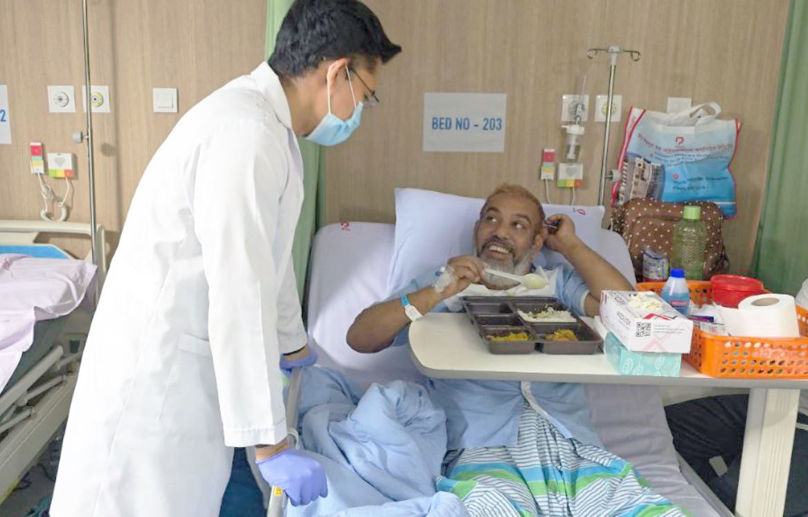 Dr. Asif Almas Haque with patient